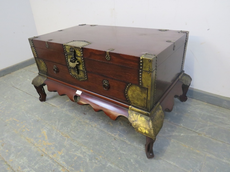 A Chinese hardwood chest, having engraved brass mounts, the hinged top compartment above one long - Image 2 of 4