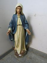 A vintage painted plaster statue of the Madonna, on a plinth base. H86cm W38cm D23cm (approx).