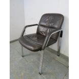 A vintage desk chair by Klober, upholstered in supple brown leather, on chrome supports. H85cm W61cm