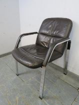 A vintage desk chair by Klober, upholstered in supple brown leather, on chrome supports. H85cm W61cm