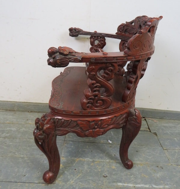 An antique Chinese lacquered tub chair, having intricately carved & pierced backrest in high relief, - Image 3 of 4