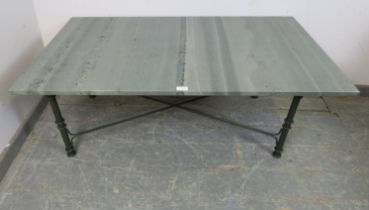 A contemporary rectangular coffee table, the loose top fashioned from Welsh smooth slate with