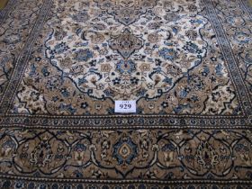 A fine Persian Kashan carpet, central medallion on cream ground with deep borders 293 x 192cms