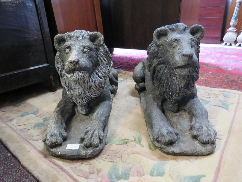 A pair of well rendered reconstituted stone lions passant, on plinth bases. H37cm W26cm D64cm ( - Image 3 of 3