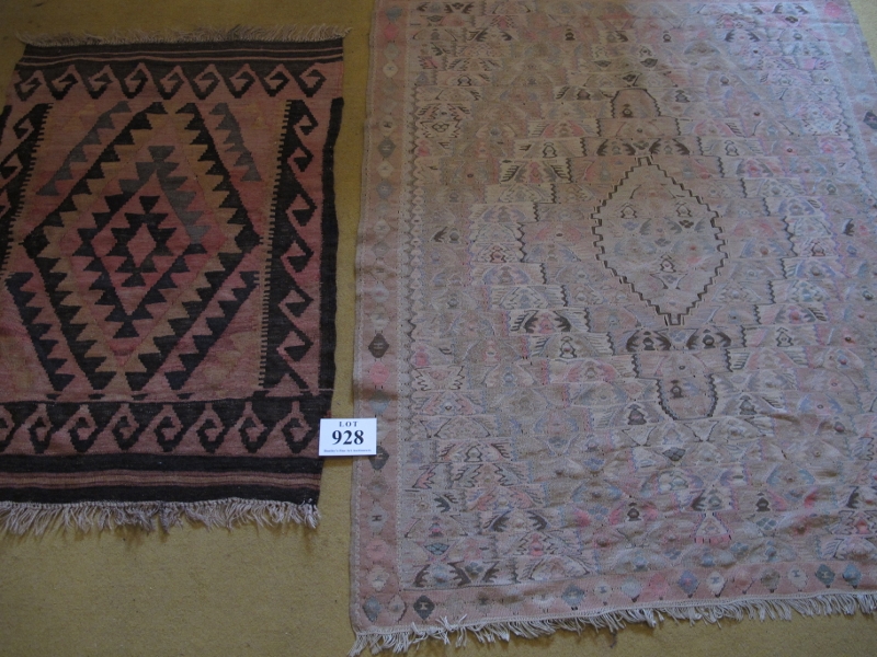 Two 20th Century Kilim rugs. large 143 x 120cms, soft pinbk and grey. Smaller rug mixture of black