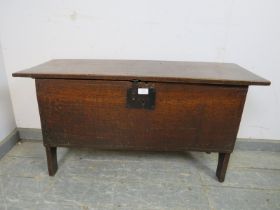 A late 17th century oak six plank coffer, having internal candle box, the front with diamond