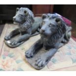 A pair of well rendered reconstituted stone lions passant, on plinth bases. H37cm W26cm D64cm (