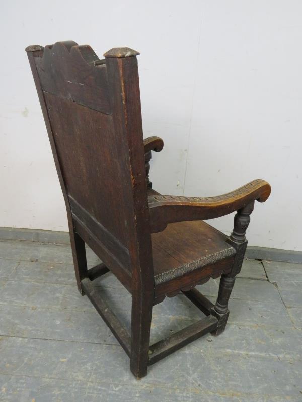 A 19th century oak Wainscott chair in the 17th century taste, the backrest profusely carved with - Bild 4 aus 4