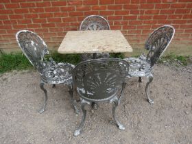 A vintage five-piece garden set painted metallic grey comprising a marble-topped square table on a