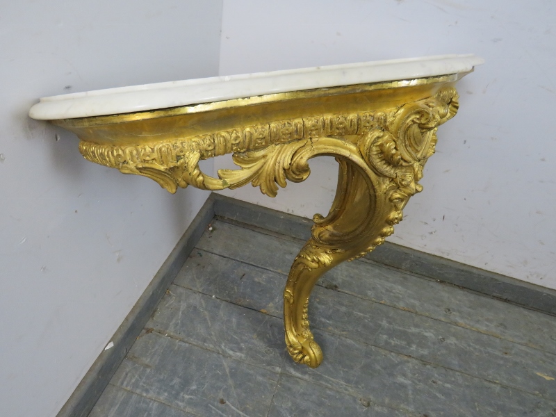 A 19th century French giltwood console table, the loose white marble top on a giltwood base with - Image 4 of 5