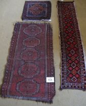 Three lkate 19/20th Cebntury Persian rugs. A runner 171 x 136cms. A five central motif rug 122 x