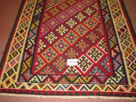 South West Persian Qashgai Kilim, central repeat pattern, multi-coloured. 240cm x 146cm (approx).