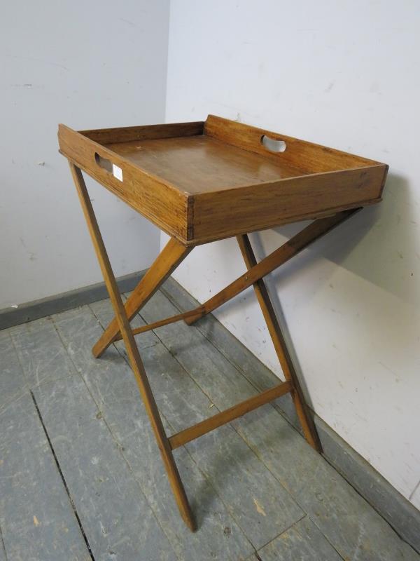 An early 20th century walnut butler’s tray on stand, the galleried tray with pierced handles to - Bild 2 aus 3