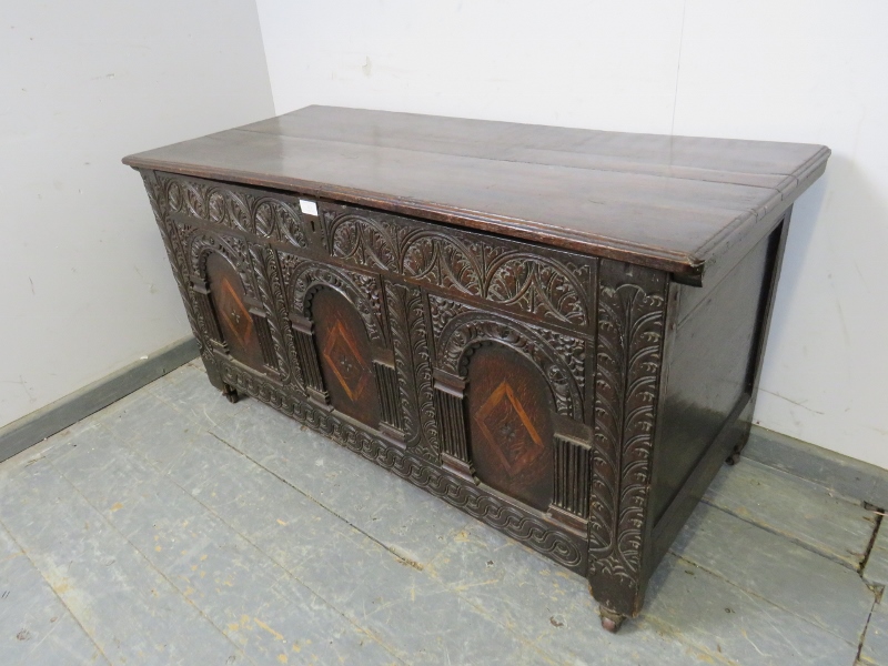 A late 17/early 18th century oak panelled coffer, having internal candle box, the front profusely - Image 2 of 3