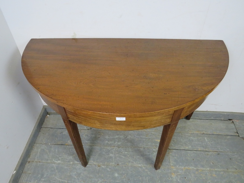 A George III mahogany demi-lune console table, strung with satinwood and boxwood, on tapered - Image 3 of 3