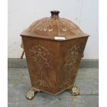 An Arts & Crafts Period hexagonal copper coal bucket, having repousse decoration and lion mask