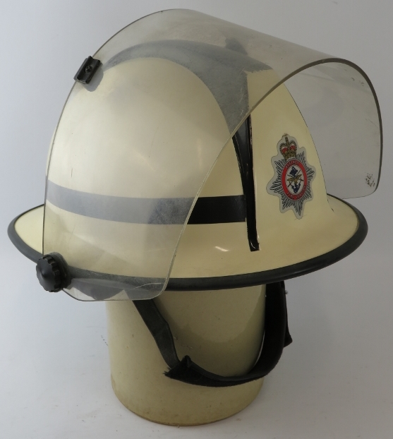 A 1970s British white Cromwell F500s fire helmet with visor, badged Defence Fire Service