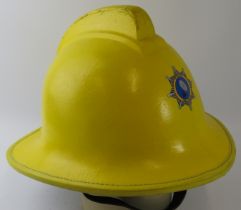 A 1987 British BT Madley Satellite Station yellow fire helmet.