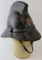 A 1960s British Hendry Metro fire helmet, badged RHFS
