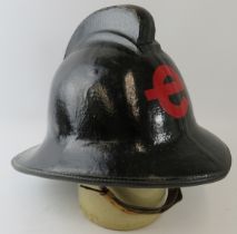 A 1980s British black cork power station fire helmet