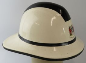 A 1980s Welsh South Glamorgan Fire Brigade white fire helmet.