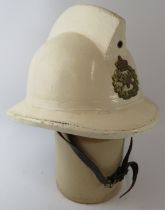 A 1970s Belgian Fire Service white cork fire helmet with Levoir label