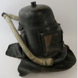 A rare late 19th century British Siebe Gorman & Co leather smoke/rescue helmet with fitted breathing