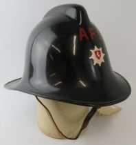 A 1960s British Kent Fire Brigade AFS black fire helmet