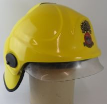 A 1990s Irish Cork Fire Brigade integrated visor fire helmet