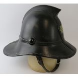A 1960s British Fire Services Association black leather Hendry Metro fire helmet