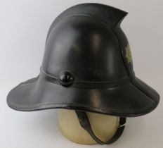 A 1960s British Fire Services Association black leather Hendry Metro fire helmet