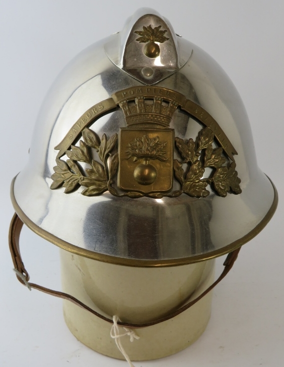 A 1970s French Sapeurs Pompiers Fire Service polished chrome fire helmet with brass mounts. - Image 2 of 3