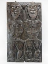 A pair of carved and ebonised wood figural panels. Possibly Sepik region, Papua New Guinea. With