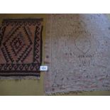 Two 20th Century Kilim rugs. large 143 x 120cms, soft pinbk and grey. Smaller rug mixture of black