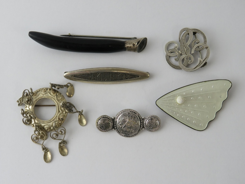Six mixed silver brooches including a Norwegian enamelled butterfly wing marked CND, a Kelt