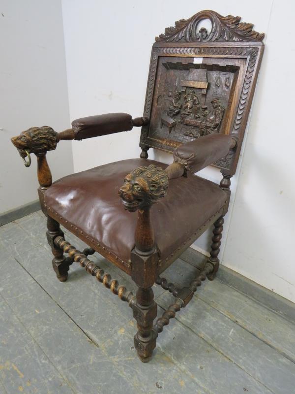 A 19th century oak throne chair, the acanthus carved cornice above a back panel with relief carved - Image 2 of 4
