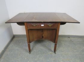 An unusual Georgian mahogany supper/writing table, having one long cock-beaded drawer with baize