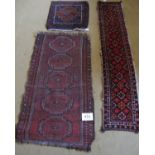 Three lkate 19/20th Cebntury Persian rugs. A runner 171 x 136cms. A five central motif rug 122 x
