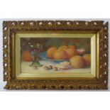 Fred Spencer (Act. c1900-1904) - An ornate framed & glazed watercolour, 'Still life of oranges in