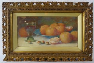 Fred Spencer (Act. c1900-1904) - An ornate framed & glazed watercolour, 'Still life of oranges in