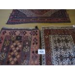 Three early mid 20th Century Kilim rugs, one pink and brown 94 x 82cms, one cream and red 102 x