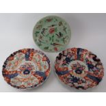 A Chinese enamelled celadon plate, 19th century and two Japanese Imari scalloped plates, late