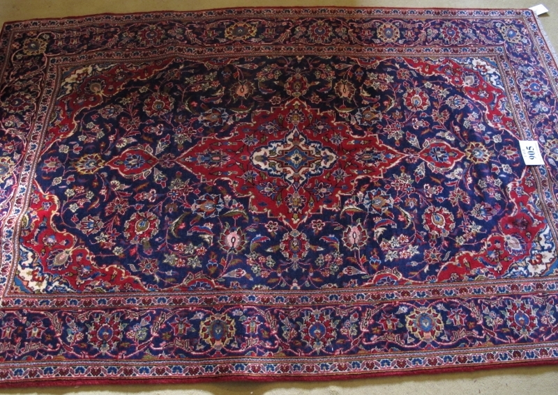 A central Persian Kashan rug. Typical Kashan with central motif. Red on blue ground. 230cm x - Image 3 of 3