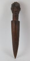 Tribal Art: A West African carved wood figural peg or possibly sceptre. Formed as tusk mounted