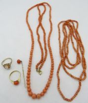 A graduated coral necklace, approx 18" long, a small beaded coral necklace, approx 24" long, a