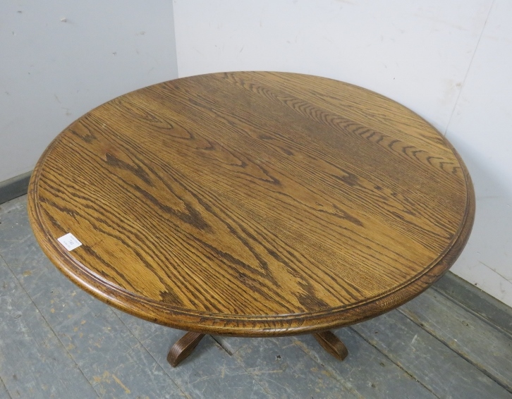 A vintage solid medium oak circular coffee table, on a bulbous turned column with quatreform base. - Image 2 of 4