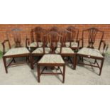 A set of eight (6+2) antique Georgian Revival mahogany dining chairs, the shield backs with shaped