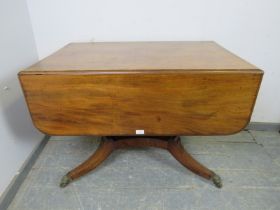 A good Regency Period mahogany Pembroke table, having long drawers to either end with pressed