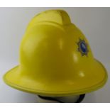 A 1987 British BT Madley Satellite Station yellow fire helmet.