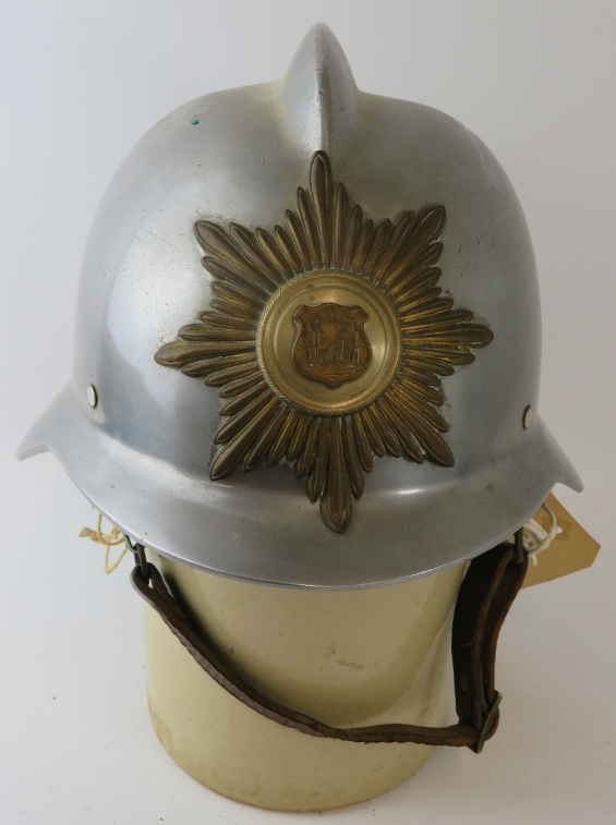 A 1970s Danish Fire Service steel fire helmet with brass badge - Image 2 of 3